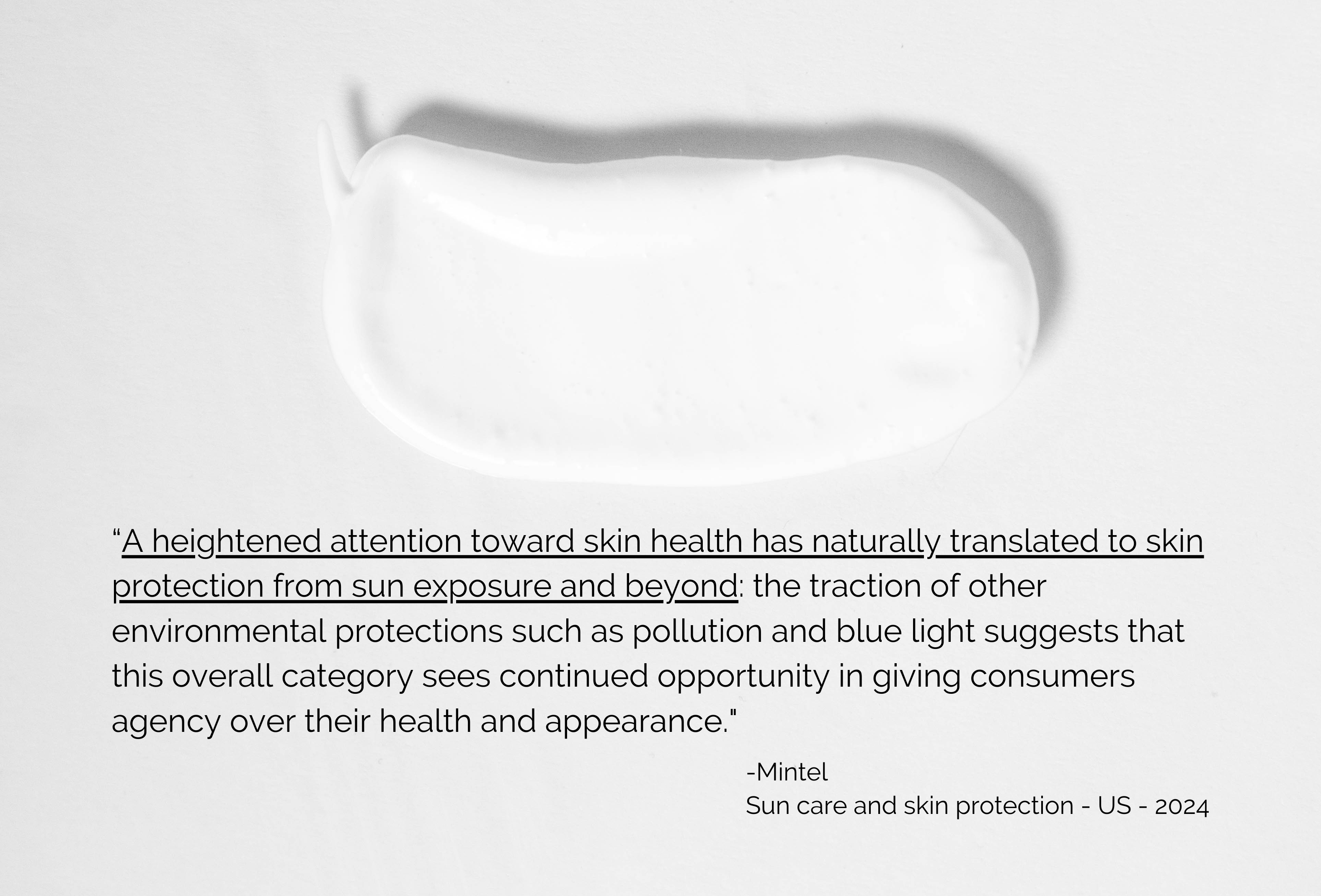 A woman laying down on a wooden deck, laughing