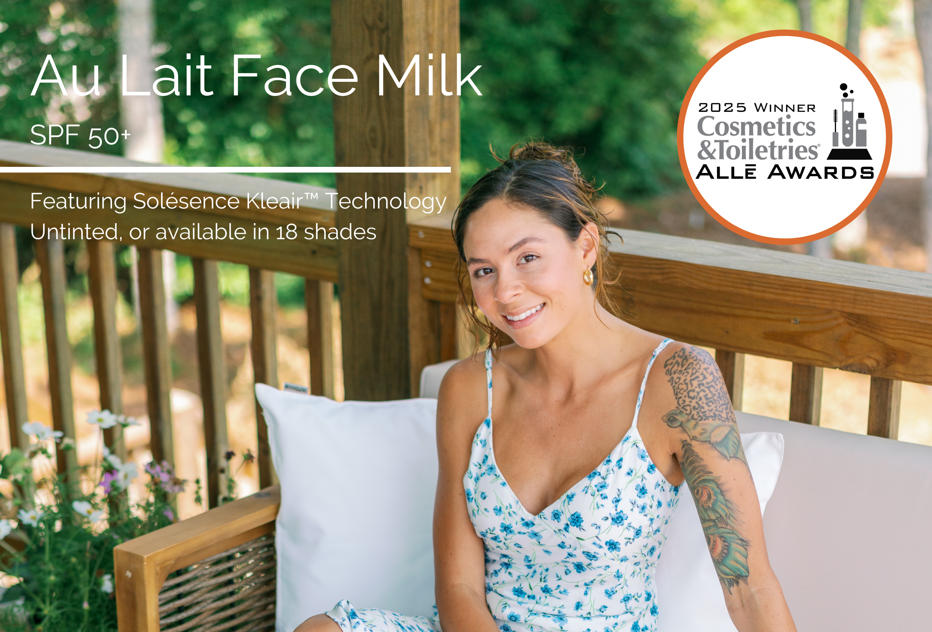 Au Lait Face Milk - Smiling woman outside in a floral dress. 