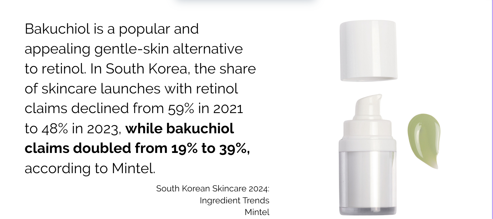 A makeup component bottle sitting next to a drop of green makeup spread out on a table.