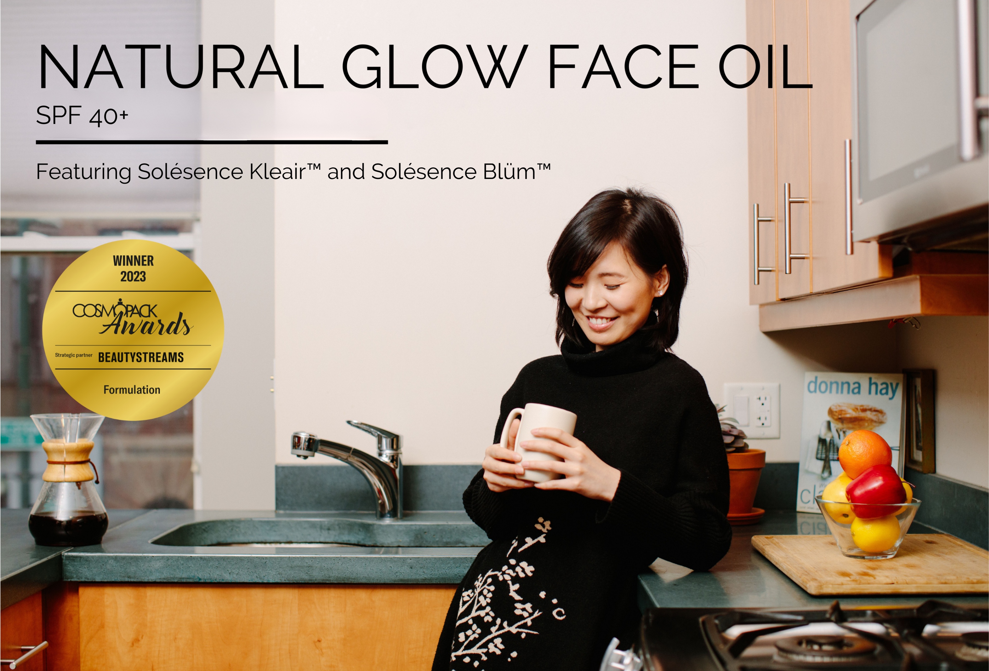woman standing in kitchen drinking coffee in the morning