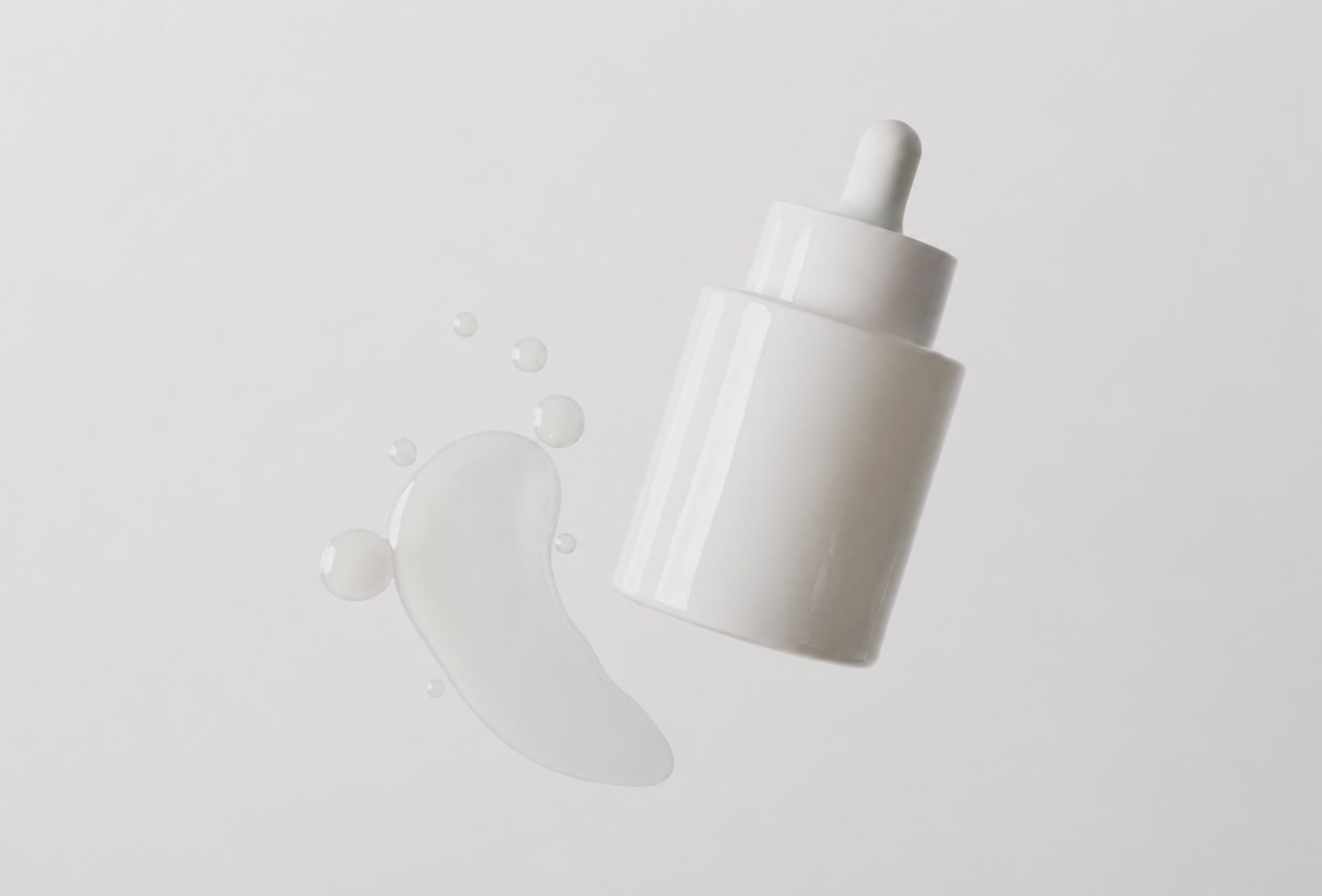 Swatches of makeup smeared on a white background.
